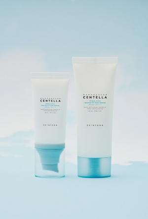 Saules serums SKIN1004 Sejai YABUKO ar SPF50, mitrināšanas un ādas kopšanas īpašībām, zaļa un caurspīdīga iepakojuma attēls.